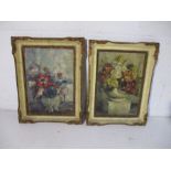 Two framed oil paintings on board depicting still life of flowers, both signed to bottom corner by