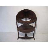 A Georgian mahogany inlaid corner washstand with single drawer.