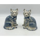 A pair of blue and white Rye Pottery cats