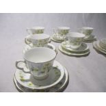A Colclough bone china part tea set including five trios.