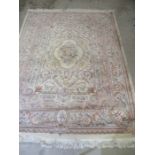 A Chinese cream ground rug. 350cm x 260cm