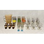 A collection of various retro glass with coloured detail including lemonade jug and six glasses,