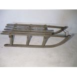 A vintage wooden sledge. A/F