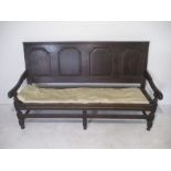 An antique oak settle