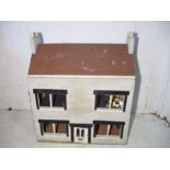 A vintage dolls house, height 71cm, width 61cm
