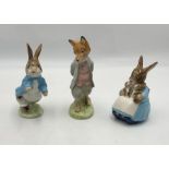 Three Beswick Beatrix Potter figurines including Mrs. Rabbit and Bunnies, Foxy Whiskered Gentlemen