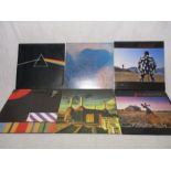 A collection of six Pink Floyd 12" vinyl albums including Dark Side of The Moon (re-issue with two