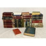 A collection of various vintage books including The Girl's Own Outdoor Book, illustrated guide