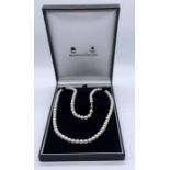 A boxed Mappin & Webb set of cultured pearls with 18ct gold ball clasp