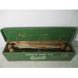 A boxed croquet set made by Jacques, London in original box, with cast iron hoops, brass bound