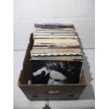 A collection of mainly 1980's 12" vinyl singles including Dire Straits, Phil Collins, Michael