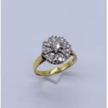 An 18ct gold diamond cluster ring