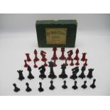 The Rose Chess set in original box, lead pieces painted in red and black