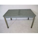 A painted wooden garden table
