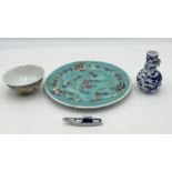 A small collection of Chinese porcelain including a small blue and white vase with climbing dragon