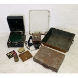 A collection of various items including a copper tray, cased gramophone, artists box, vintage wall