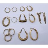 A collection of odd 9ct gold hoop earrings, total weight 9.5g