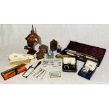 A collection of various items including silver plated carving set, wooden carved sculpture, dressing