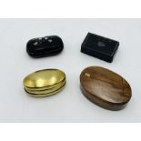 A collection of vintage snuff boxes