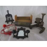 A miscellaneous assortment of items including two cobblers last, an electric lamp, a vintage