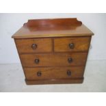 A Victorian mahogany small chest of four drawers - height 89cm, width 92cm, depth 44cm