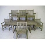 A large teak garden table with six chairs, made by Dorchester furniture. 200cm x 110cm