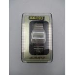 A vintage Seiko calculator-alarm C359-5000 gents watch in original box - missing battery cover to