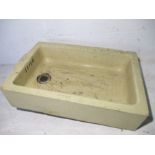 A brown Belfast sink. 71cm x 46cm. Height 18cm