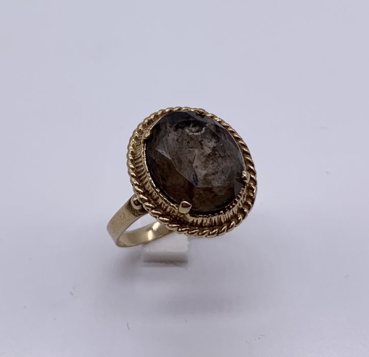 A 9ct gold ring set with a smoky topaz - Image 2 of 4