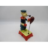 A reproduction cast iron novelty Popeye boxing toy