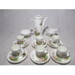 An Elizabethan fine bone china coffee set depicting hunting scenes, included coffee pot, creamer,