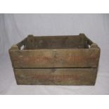 A vintage wooden apple crate, stamped with Tardebigge Orchards Ltd (Worcestershire)