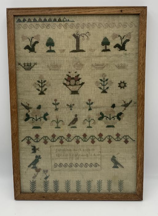 A small framed sampler by Caroline Rickards aged 11years August 14th 1826