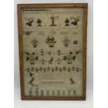 A small framed sampler by Caroline Rickards aged 11years August 14th 1826