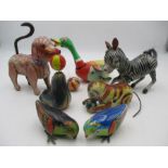 A collection of tin plate clockwork animals including Lehmann
