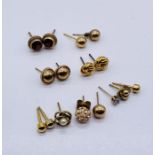 A collection of 9ct gold earrings, total weight 7.5g