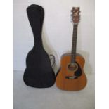 A Yamaha FG- 411S acoustic six string guitar in carry case