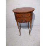 A French oval bedside cabinet with two drawers (one handle replaced)