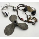 A WW2 throat microphone and headphones along with another set of vintage headphones by Sterling,