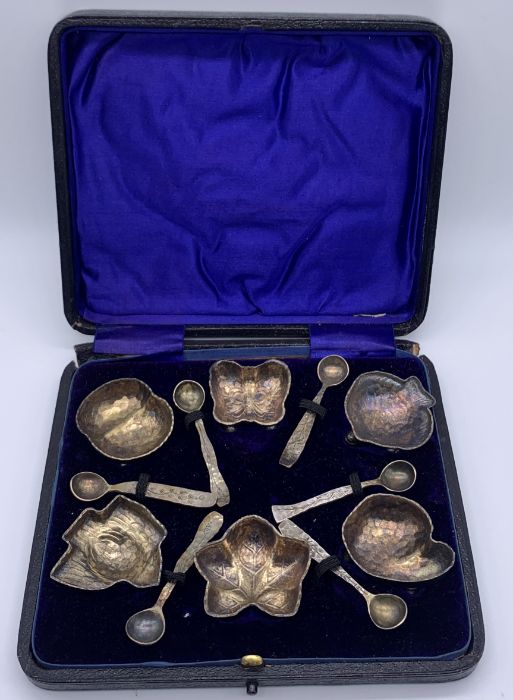 A cased set of six Tiffany & Co. Sterling silver salts with matching spoons, the salts are each in