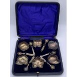 A cased set of six Tiffany & Co. Sterling silver salts with matching spoons, the salts are each in