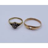 An 18ct gold diamond cluster ring- 1 stone missing (weight 2.6g) along with a tested 14ct gold ring-