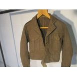 A 1955 size 2 battledress jacket, height 5ft 3in to 5ft 4in, breast 34in to 35in, waist 30in to