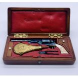 A miniature cased model Colt revolver attributed to Tom Weston of Mexico City, in blued steel and