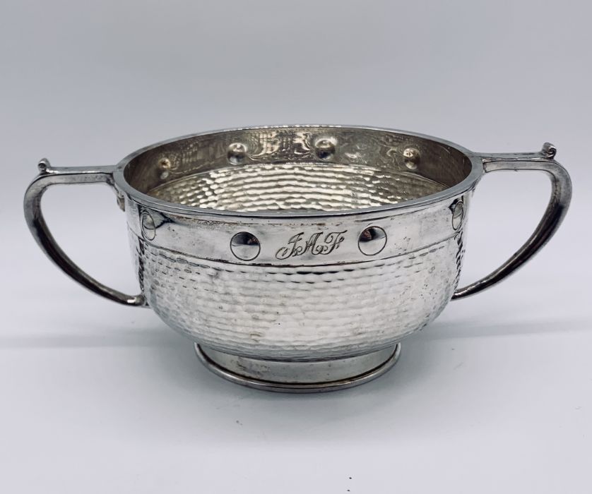 A cased Arts & Crafts hallmarked silver two handled bowl and matching spoon, hallmarked for Barker - Image 2 of 5