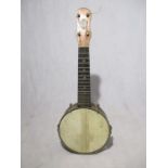 A vintage Dulcetta (London) four string banjolele - numbered 25088