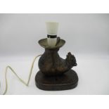 An antique Black Forest hand carved bear table lamp