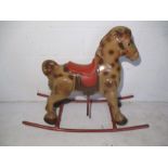 A Mobo tin plate rocking horse circa 1950's