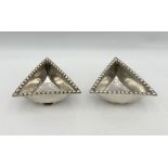 A pair of Scottish heavy silver triangular dishes, reproductions of "Traprain Treasure" retailed