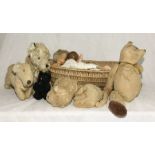 A collection of vintage teddies, dolls etc